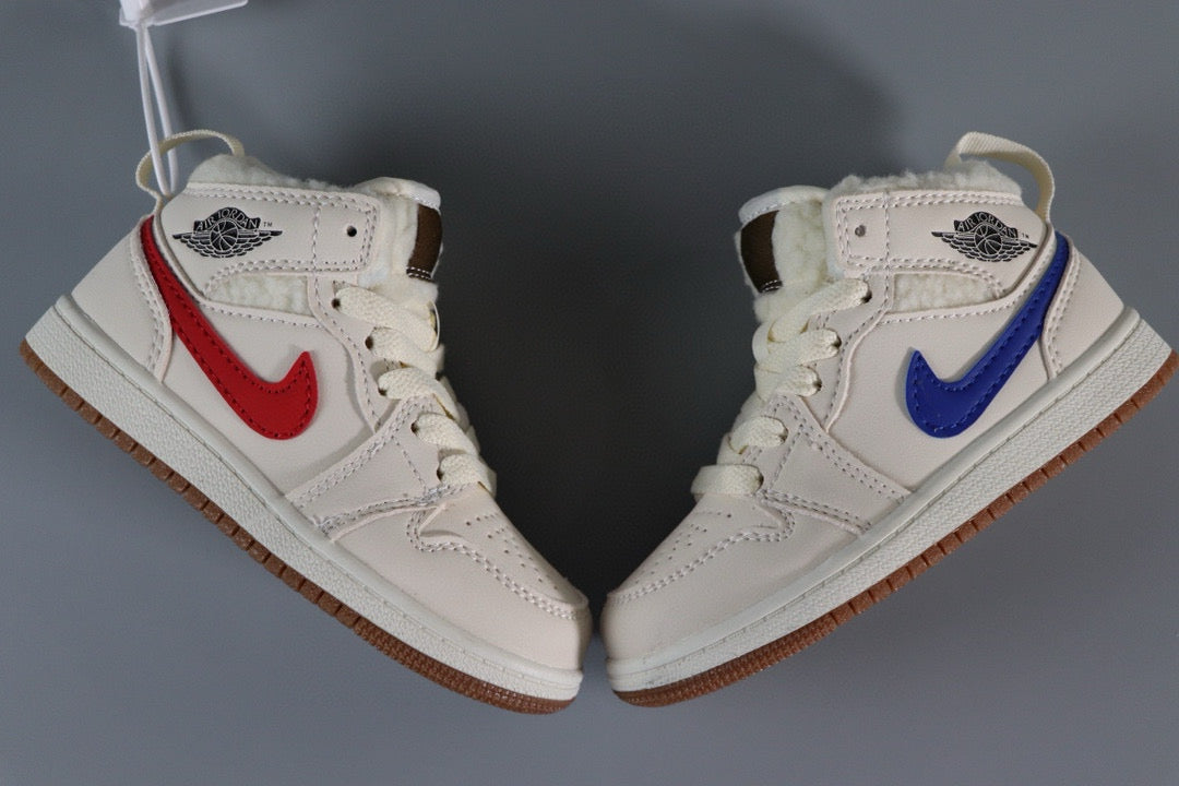 a pair of white sneakers with red, blue, and brown detailing