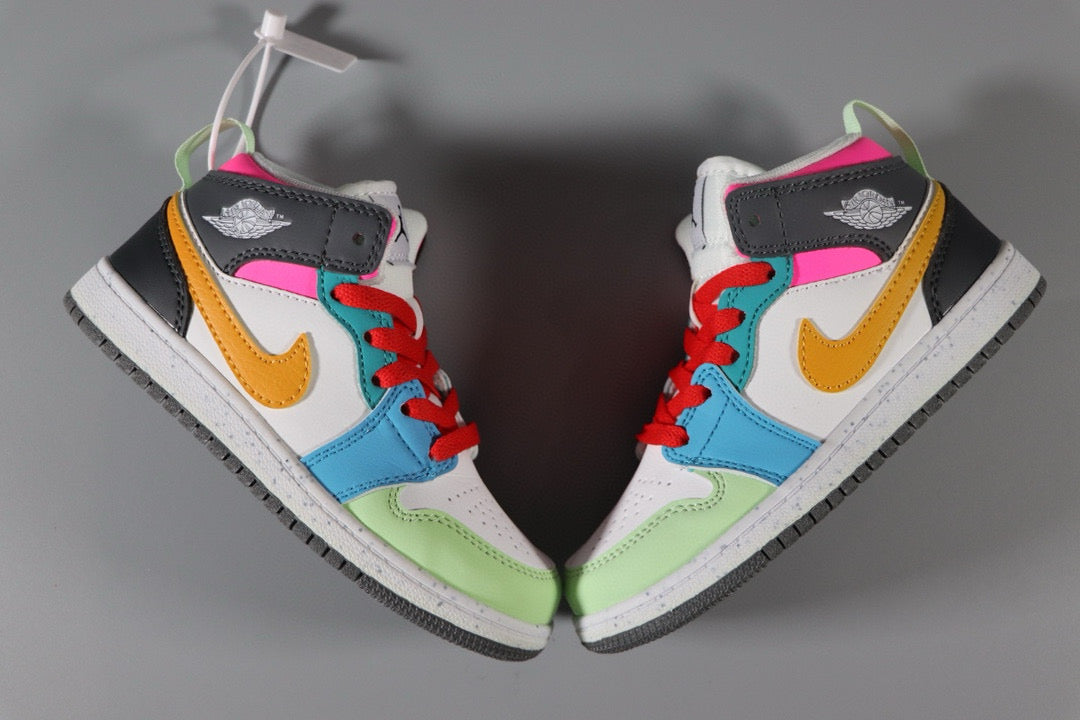 a pair of sneakers with colorful shoes on top of them