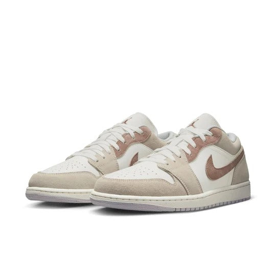 a pair of white and brown sneakers on a white background