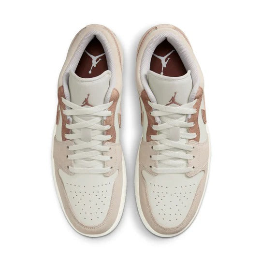 a pair of white and brown sneakers on a white background