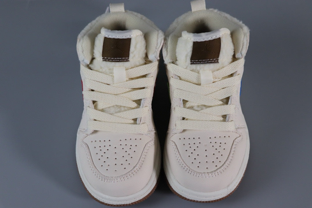 a pair of white sneakers on a gray background