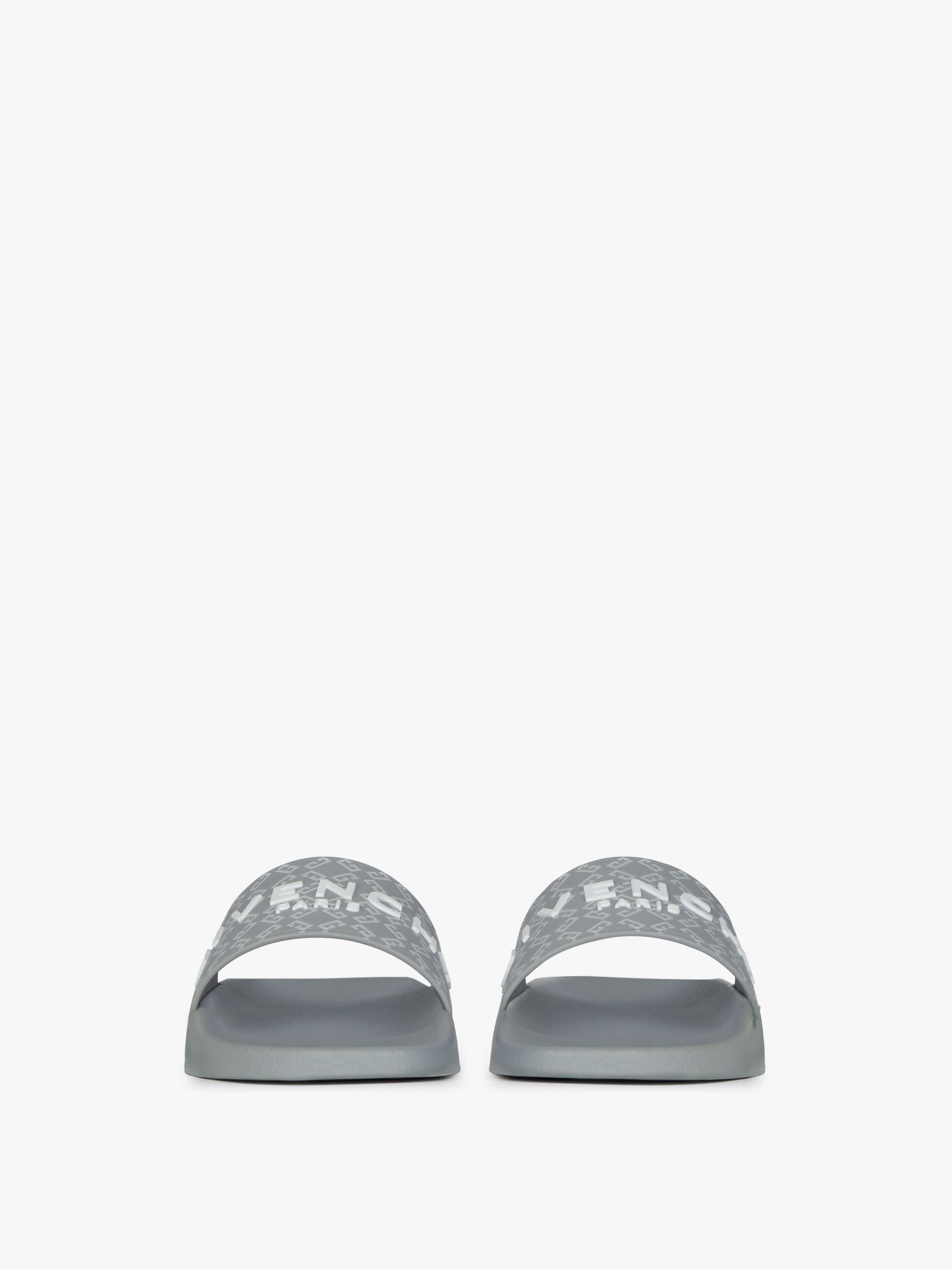 New
Slide flat sandals in monogram 72 rubber