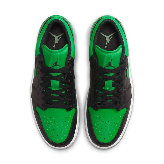 a pair of green and black sneakers