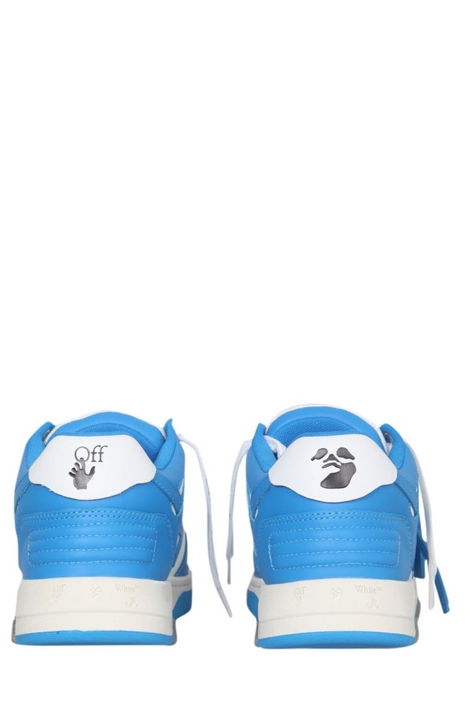 a pair of blue and white sneakers on a white background