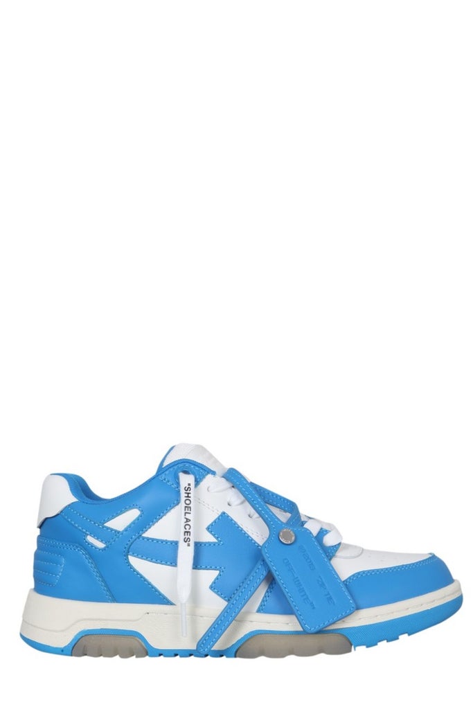 a blue and white sneaker with a white arrow on the side