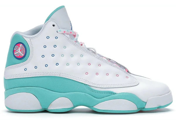 a white and blue sneaker with pink accents